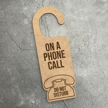 Load image into Gallery viewer, On a Phone Call Do Not Disturb Laser Engraved Door Hanger
