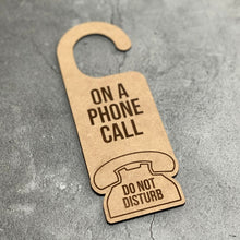 Load image into Gallery viewer, On a Phone Call Do Not Disturb Laser Engraved Door Hanger
